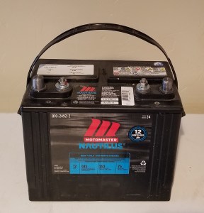 a marine battery, looks just like an automotive battery