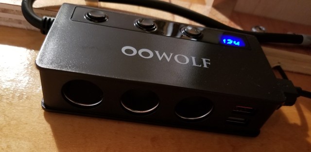 12 volt power bar with receptacles, USB ports and a voltage display