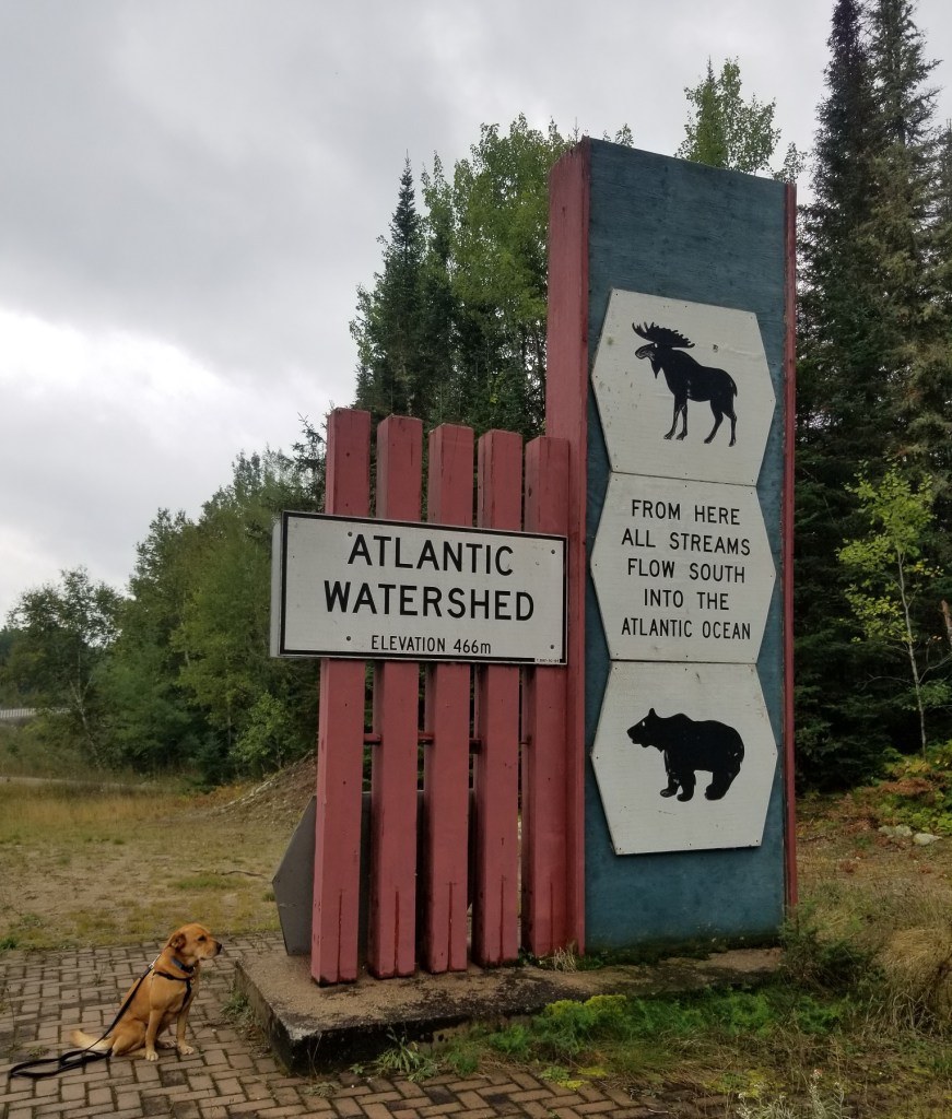 sign marking the watershed boundary between arctic and atlantic