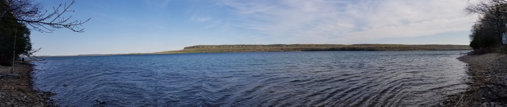 panoramic view of Niagara Escarpment, Georgian Bay in foreground