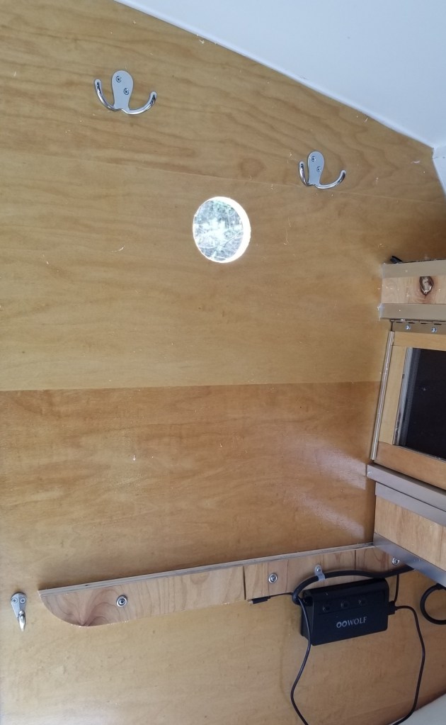 interior of trailer wall with 3" hole