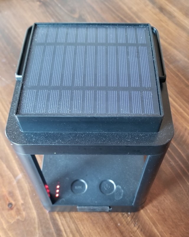 small solar panel atop camping lantern
