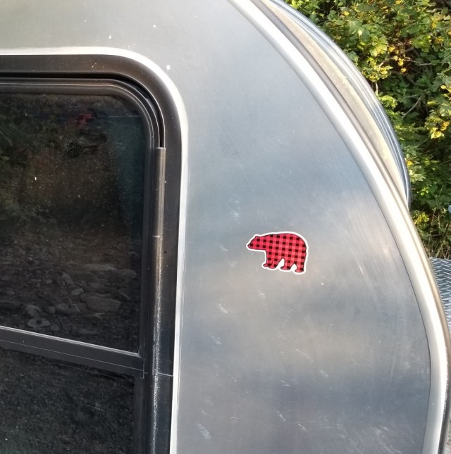 side of teardrop trailer showing bear image on a sticker