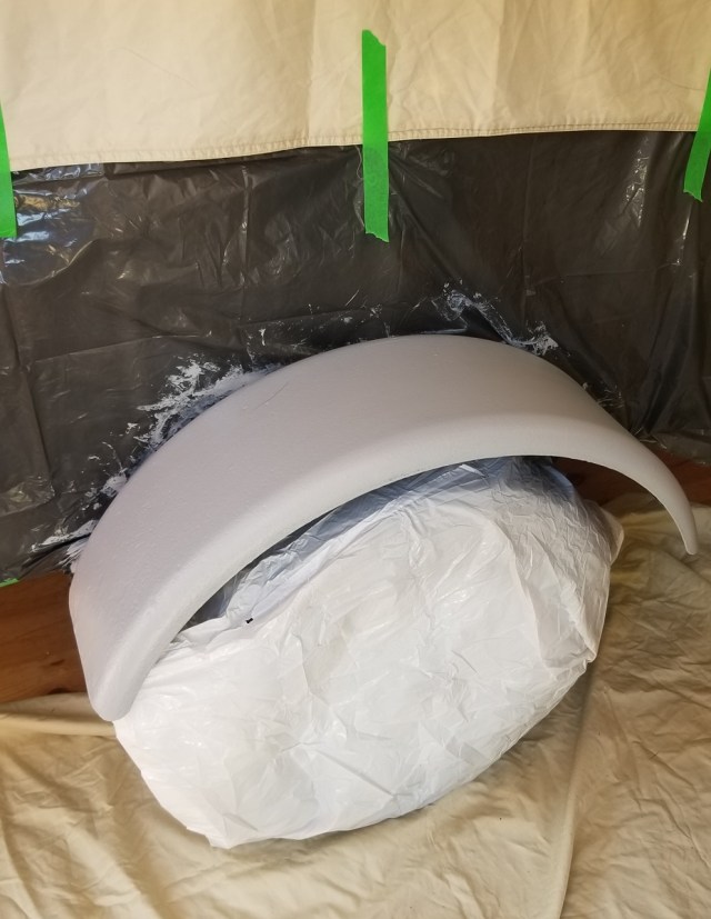 teardrop camper fender, shown primed and masked for painting